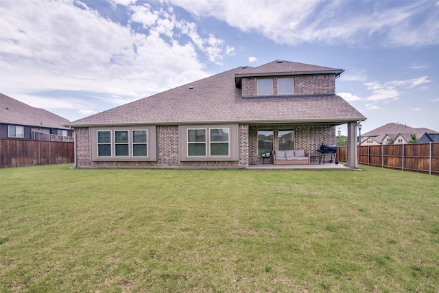 11100 Tanager Ln, Cross Roads, TX 76227 - rear view of house with a fenced backyard, a patio, a shingled roof, and brick siding