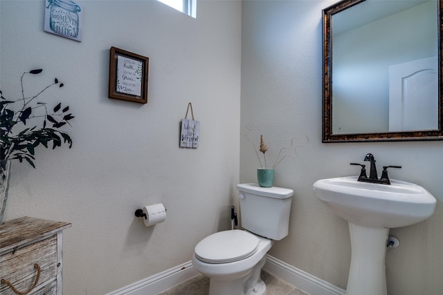 11100 Tanager Ln, Cross Roads, TX 76227 - half bathroom with toilet and tile patterned floors