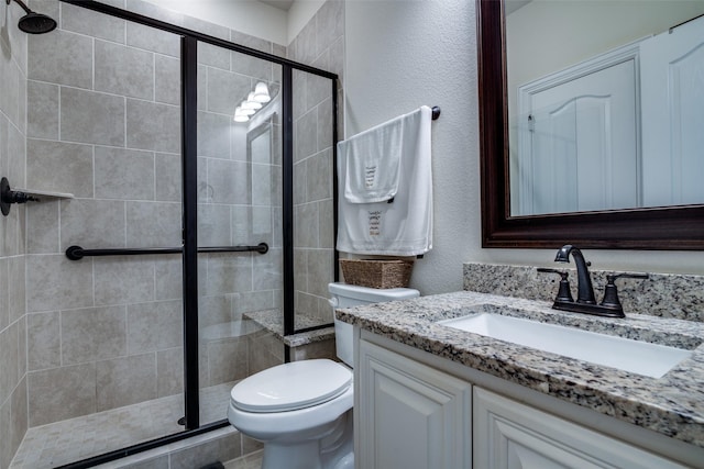 11100 Tanager Ln, Cross Roads, TX 76227 - bathroom with vanity, a stall shower, and a textured wall