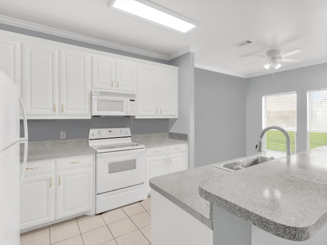 5813 Blackmon Ct, Fort Worth, TX 76137 - kitchen with white appliances, white cabinetry, light tile patterned floors, a ceiling fan, and ornamental molding