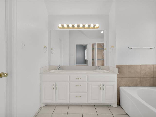 5813 Blackmon Ct, Fort Worth, TX 76137 - bathroom featuring double vanity, a garden tub, tile patterned flooring, and a shower with shower door