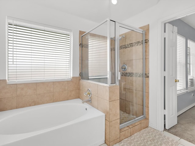 5813 Blackmon Ct, Fort Worth, TX 76137 - bathroom with a stall shower, a bath, and tile patterned flooring