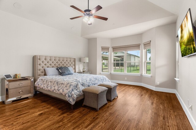 1707 Ponderosa Trl, Sachse, TX 75048 - bedroom featuring wood finished floors, a ceiling fan, and vaulted ceiling