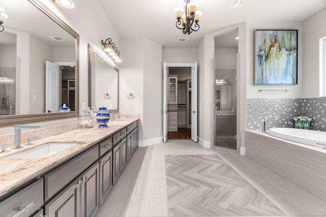 1707 Ponderosa Trl, Sachse, TX 75048 - full bath with a shower stall, double vanity, a garden tub, and a walk in closet