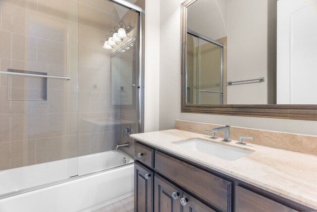 1707 Ponderosa Trl, Sachse, TX 75048 - full bath featuring vanity and enclosed tub / shower combo