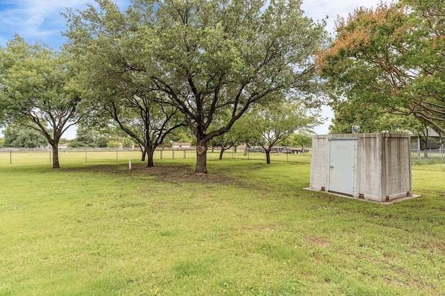 1707 Ponderosa Trl, Sachse, TX 75048 - view of yard with a storage shed