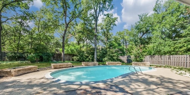 5016 Kemble St, Fort Worth, TX 76103 - view of swimming pool featuring a patio and a fenced backyard
