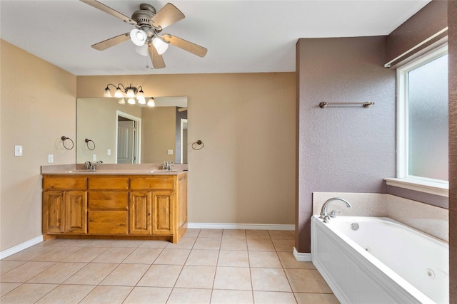 875 Cr221, Stephenville, TX 76401 - bathroom featuring healthy amount of natural light, a jetted tub, double vanity, and a ceiling fan