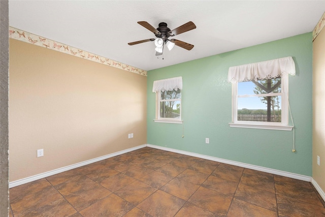 875 Cr221, Stephenville, TX 76401 - unfurnished room with ceiling fan and baseboards