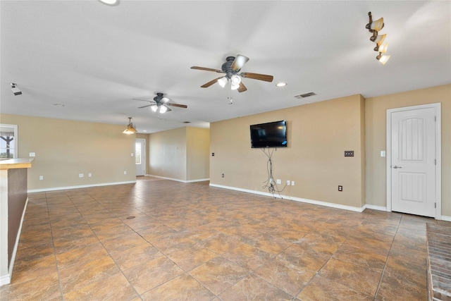 875 Cr221, Stephenville, TX 76401 - unfurnished living room with ceiling fan and recessed lighting