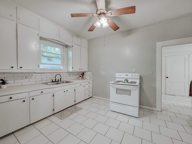 408 S Throckmorton Ave, Kerens, TX 75144 - kitchen featuring white electric stove, backsplash, light countertops, white cabinetry, and ceiling fan