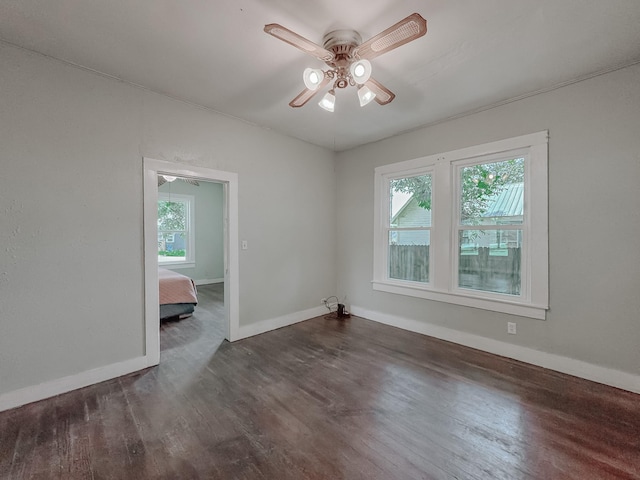 408 S Throckmorton Ave, Kerens, TX 75144 - spare room featuring a ceiling fan and wood finished floors