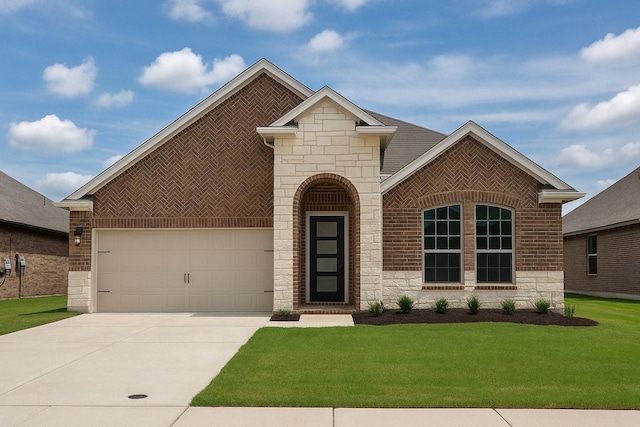 3316 Azure Ln, Celina, TX 75009 - french country inspired facade with stone siding, a front lawn, concrete driveway, an attached garage, and brick siding