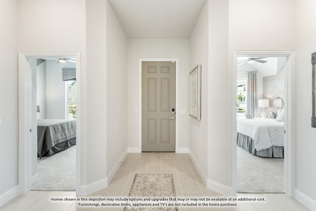 2303 Christopher Rd, Mansfield, TX 76063 - tiled entryway with ceiling fan and carpet flooring