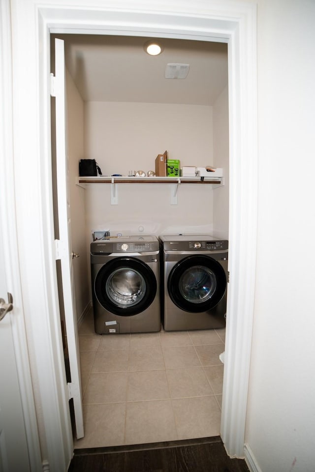 6428 Wales St, Celina, TX 76227 - laundry room featuring washing machine and dryer and tile patterned flooring