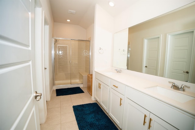 6428 Wales St, Celina, TX 76227 - full bathroom with tile patterned flooring, a shower stall, double vanity, and recessed lighting