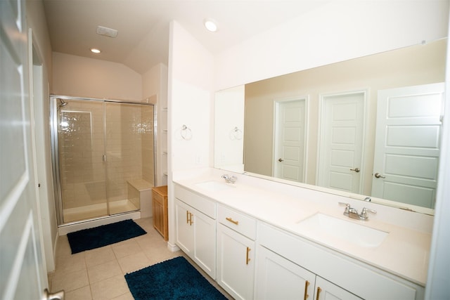 6428 Wales St, Celina, TX 76227 - bathroom featuring tile patterned floors, double vanity, a stall shower, and recessed lighting