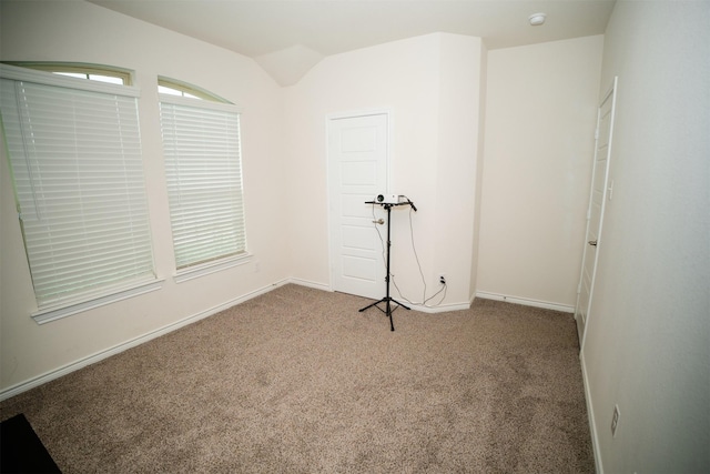 6428 Wales St, Celina, TX 76227 - carpeted empty room featuring a smoke detector and lofted ceiling