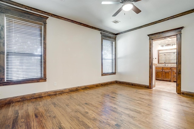 1023 Winding Creek Dr, Kennedale, TX 76060 - spare room featuring crown molding, ceiling fan, and light wood finished floors