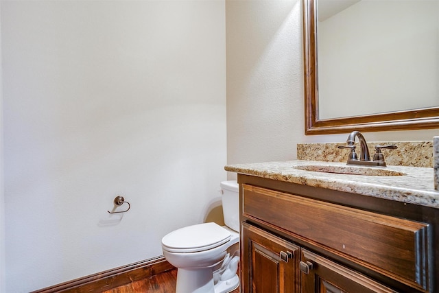 1023 Winding Creek Dr, Kennedale, TX 76060 - half bath featuring vanity and wood finished floors
