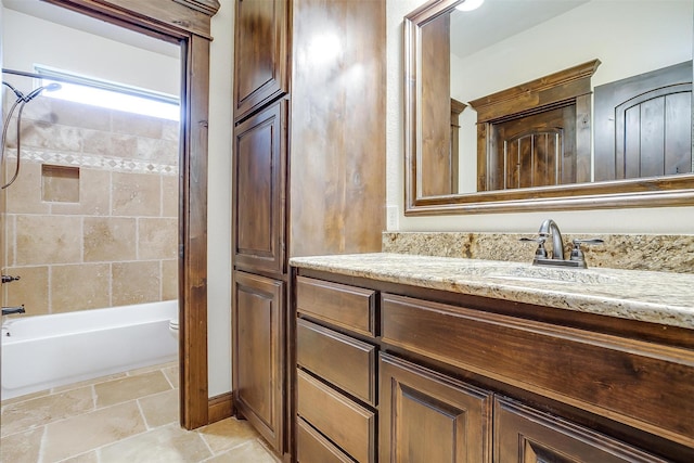 1023 Winding Creek Dr, Kennedale, TX 76060 - bathroom with vanity,  shower combination, and stone tile floors
