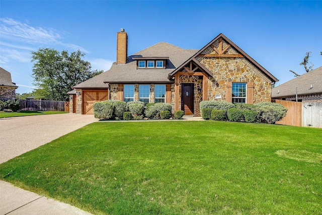 1023 Winding Creek Dr, Kennedale, TX 76060 - view of front of home featuring a chimney, stone siding, concrete driveway, and an attached garage