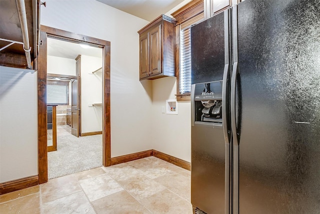 1023 Winding Creek Dr, Kennedale, TX 76060 - laundry area featuring light carpet, cabinet space, and hookup for a washing machine