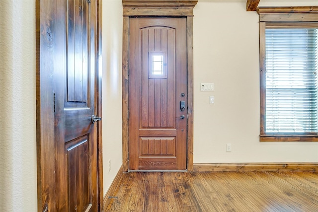 1023 Winding Creek Dr, Kennedale, TX 76060 - entryway featuring wood finished floors and baseboards