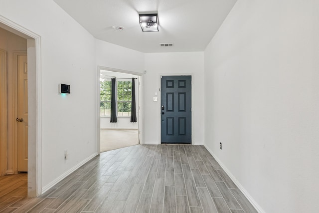 326 Blackhaw Dr, Fate, TX 75087 - foyer with light wood-style flooring and baseboards