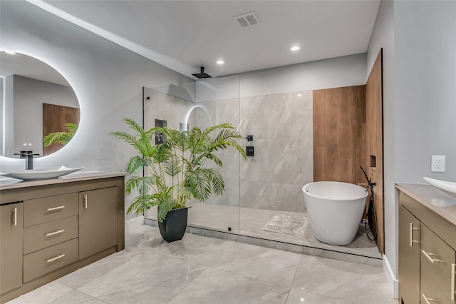3449 W T Parr Rd W, Grapevine, TX 76051 - full bath with vanity, marble finish flooring, a freestanding tub, and a walk in shower