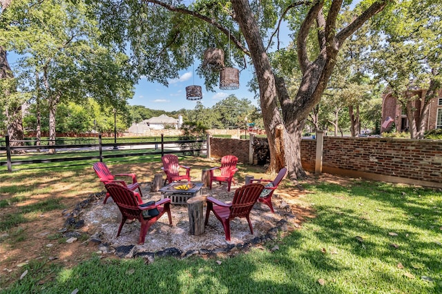3449 W T Parr Rd W, Grapevine, TX 76051 - fenced backyard with an outdoor fire pit