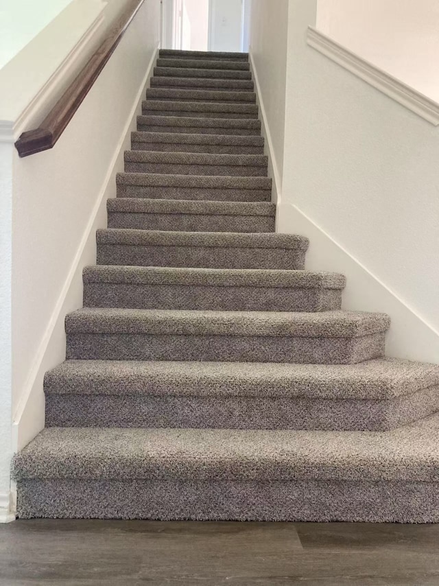 2601 Pinto Dr, Denton, TX 76210 - staircase with wood finished floors