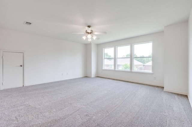 2601 Pinto Dr, Denton, TX 76210 - spare room with light colored carpet and ceiling fan
