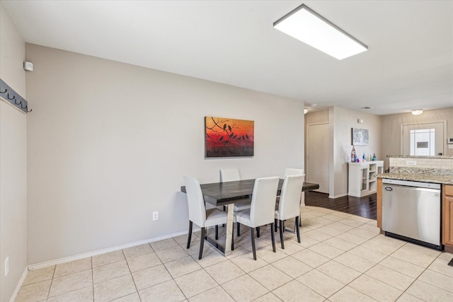 2124 Franks St, Fort Worth, TX 76177 - dining space featuring light tile patterned flooring and baseboards
