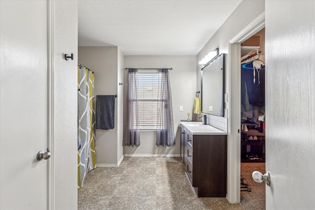 2124 Franks St, Fort Worth, TX 76177 - bathroom featuring vanity and a spacious closet