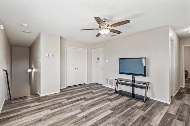 2124 Franks St, Fort Worth, TX 76177 - unfurnished living room featuring wood finished floors and a ceiling fan