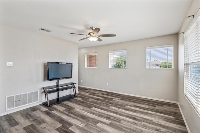2124 Franks St, Fort Worth, TX 76177 - unfurnished living room featuring dark wood-type flooring and ceiling fan