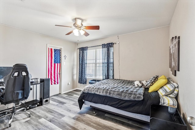 2124 Franks St, Fort Worth, TX 76177 - bedroom with wood finished floors and ceiling fan