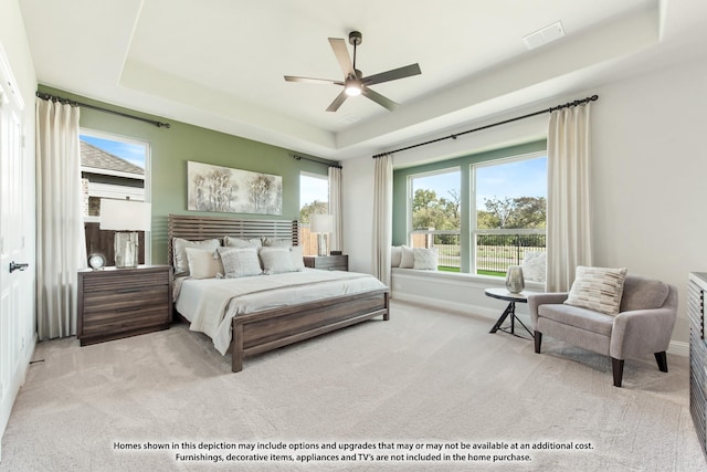 2301 Christopher Rd, Mansfield, TX 76063 - carpeted bedroom with a raised ceiling and a ceiling fan