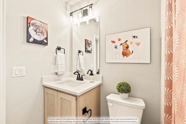 2301 Christopher Rd, Mansfield, TX 76063 - bathroom with toilet and vanity