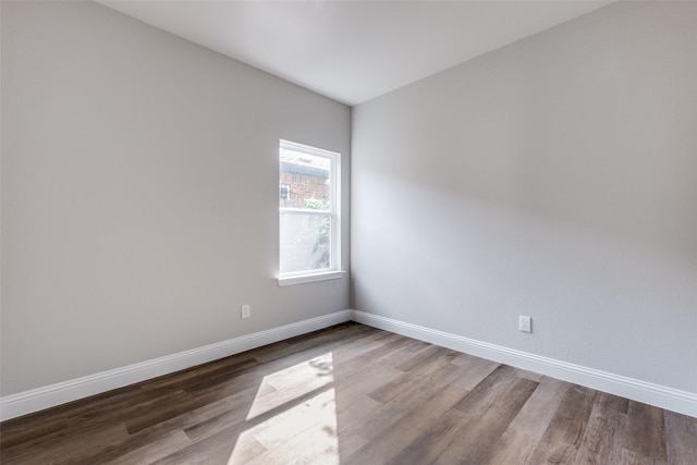 2726 Lawrence St, Dallas, TX 75215 - empty room with wood finished floors and baseboards