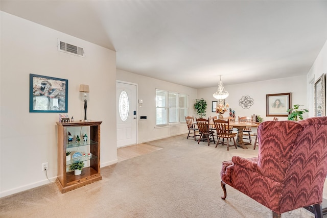 1719 W Day St, Denison, TX 75020 - carpeted dining space featuring baseboards and a chandelier