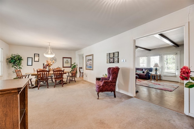1719 W Day St, Denison, TX 75020 - dining space featuring light carpet and a chandelier