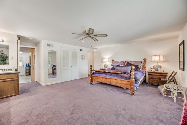 1719 W Day St, Denison, TX 75020 - bedroom featuring light colored carpet and a ceiling fan