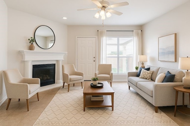 5901 Ozark Dr, Fort Worth, TX 76131 - living room with light tile patterned flooring, ceiling fan, a glass covered fireplace, and recessed lighting