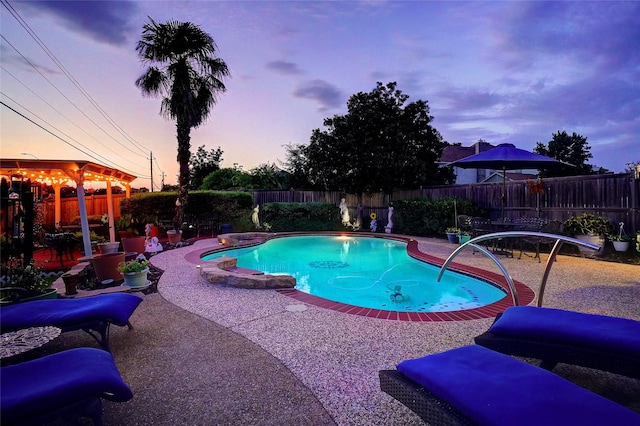 2031 Deepwood St, Mesquite, TX 75181 - pool at dusk with a fenced backyard and a patio area
