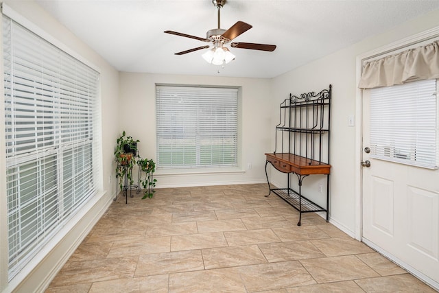 5723 Sachse St, Sachse, TX 75048 - doorway featuring a ceiling fan and baseboards