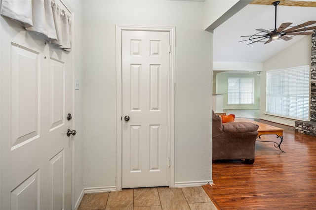 5723 Sachse St, Sachse, TX 75048 - hallway featuring lofted ceiling and a textured wall