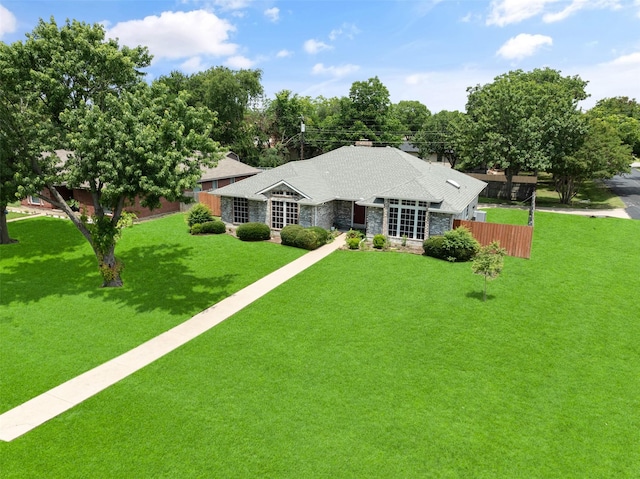5723 Sachse St, Sachse, TX 75048 - view of front of property featuring stone siding and a shingled roof