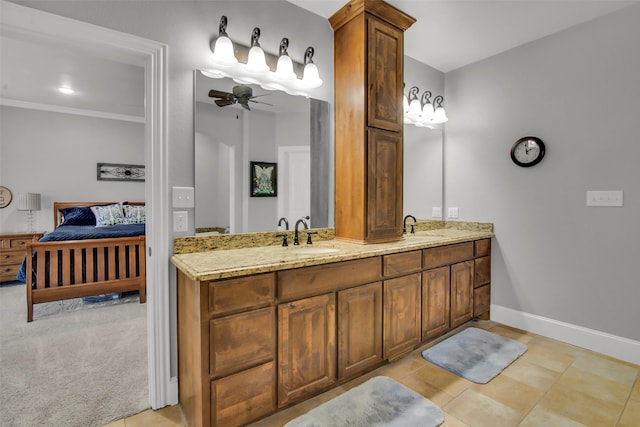 2911 Butterfield Trl, Sherman, TX 75092 - ensuite bathroom featuring ceiling fan, double vanity, and tile patterned flooring